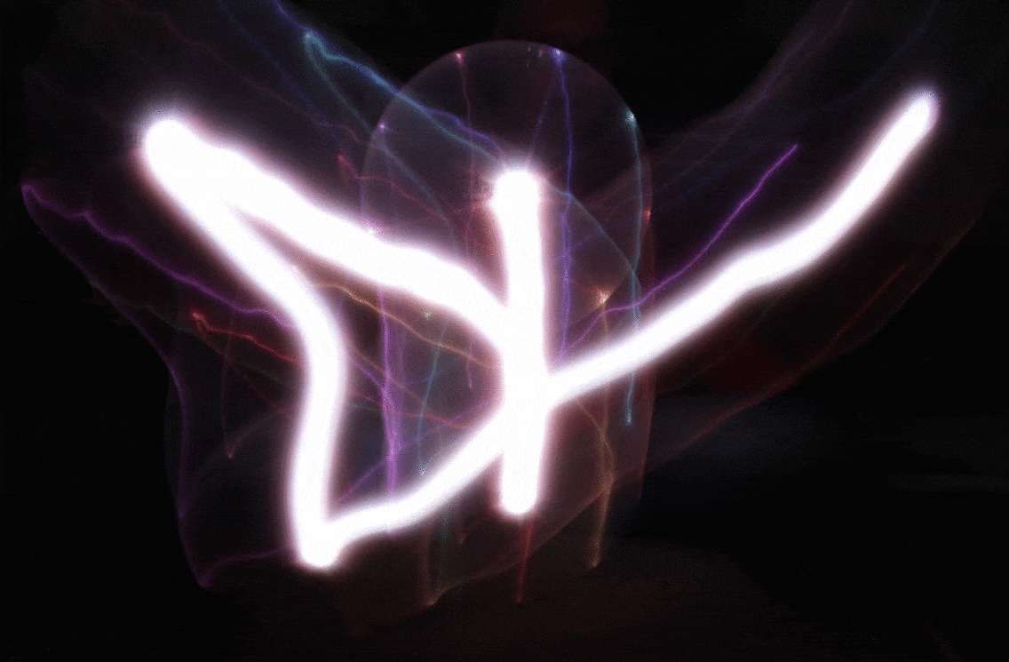 Butterfly shape made with an illuminated frisbee 4-23-2019